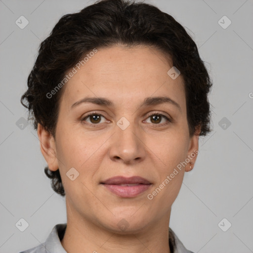 Joyful white adult female with short  brown hair and brown eyes