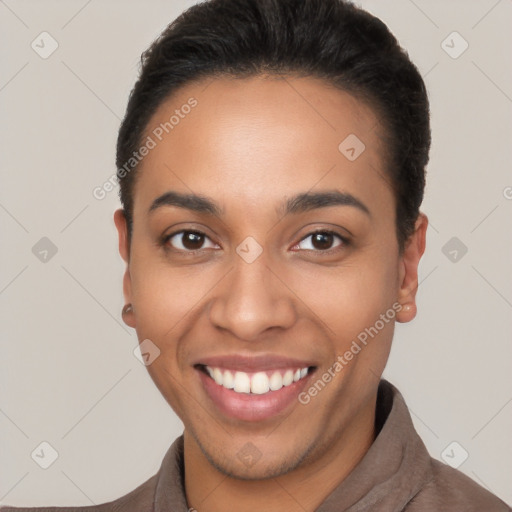 Joyful latino young-adult female with short  black hair and brown eyes