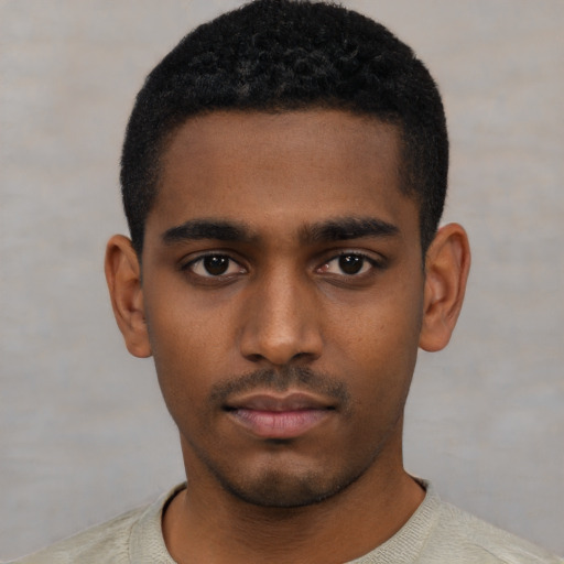Neutral black young-adult male with short  black hair and brown eyes