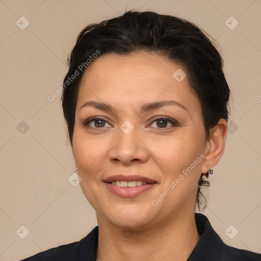 Joyful white adult female with medium  brown hair and brown eyes