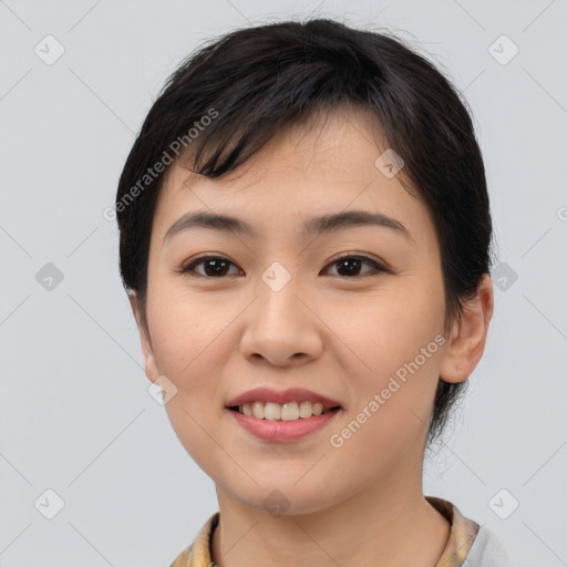 Joyful asian young-adult female with medium  black hair and brown eyes