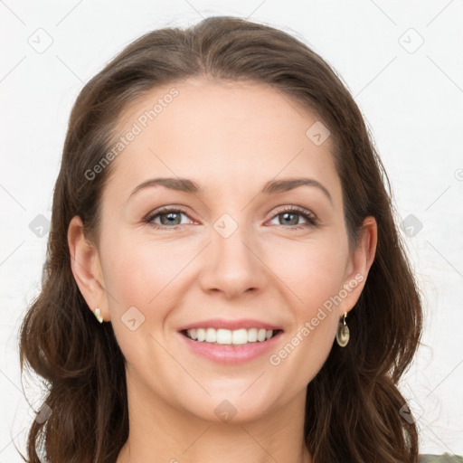 Joyful white young-adult female with long  brown hair and grey eyes