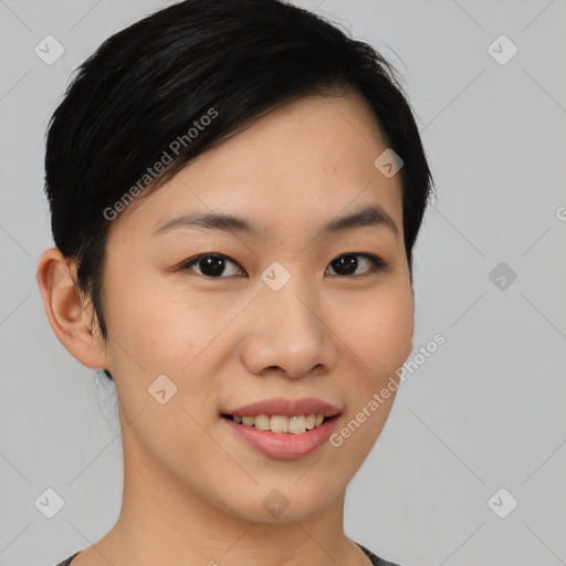 Joyful asian young-adult female with medium  black hair and brown eyes