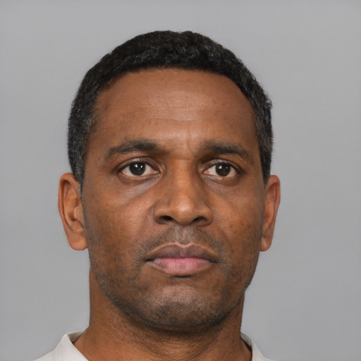 Neutral black adult male with short  black hair and brown eyes