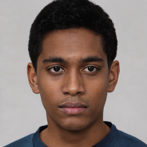 Neutral black young-adult male with short  black hair and brown eyes