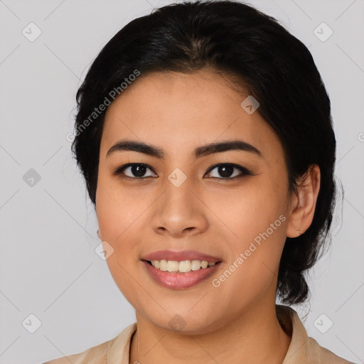 Joyful asian young-adult female with long  black hair and brown eyes