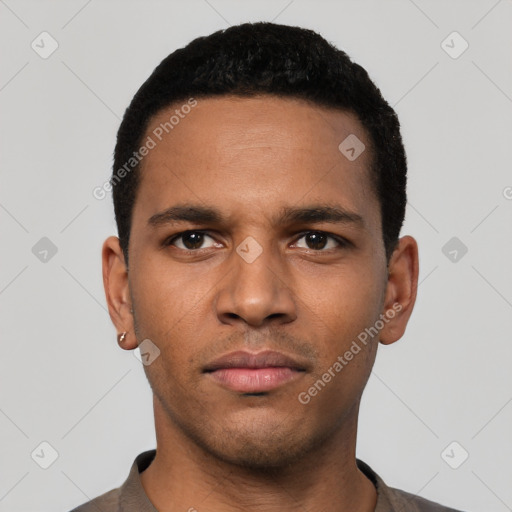 Neutral latino young-adult male with short  black hair and brown eyes