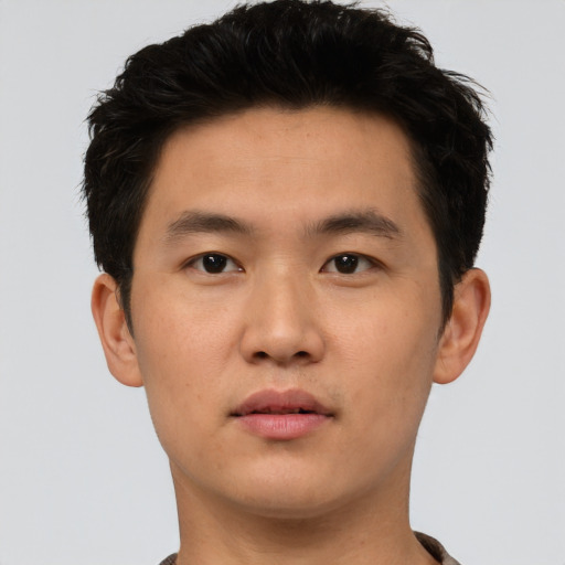 Neutral white young-adult male with short  black hair and brown eyes