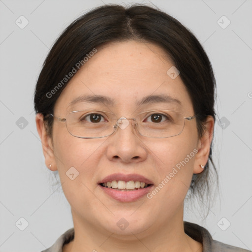 Joyful white adult female with medium  brown hair and brown eyes