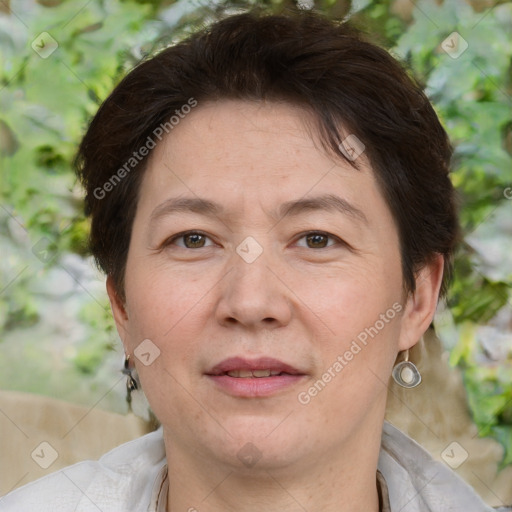 Joyful white adult female with short  brown hair and brown eyes