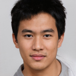 Neutral asian young-adult male with short  brown hair and brown eyes