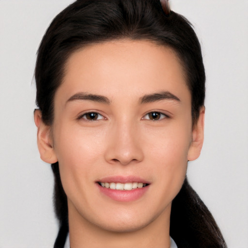 Joyful white young-adult female with medium  brown hair and brown eyes