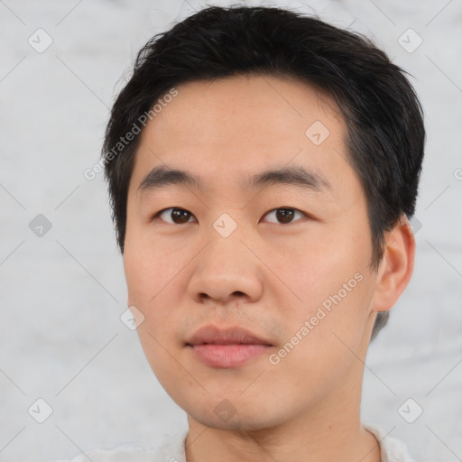 Neutral asian young-adult male with short  black hair and brown eyes