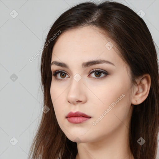 Neutral white young-adult female with long  brown hair and brown eyes