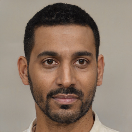 Neutral black young-adult male with short  black hair and brown eyes