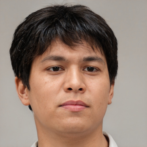 Neutral asian young-adult male with short  brown hair and brown eyes
