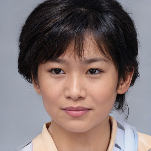 Joyful white child female with medium  brown hair and brown eyes