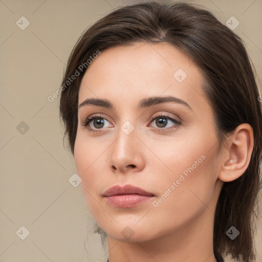 Neutral white young-adult female with medium  brown hair and brown eyes