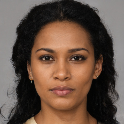Neutral black young-adult female with long  black hair and brown eyes