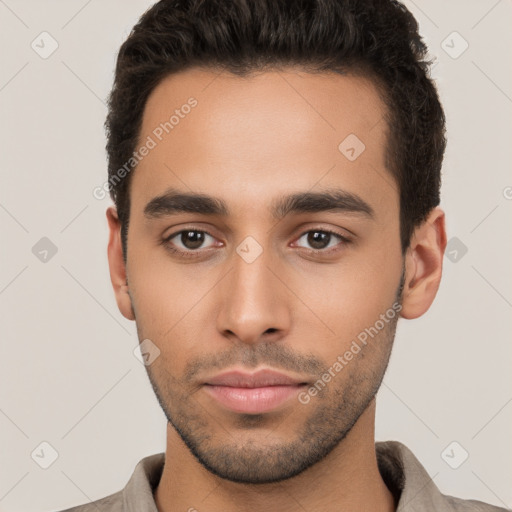 Neutral white young-adult male with short  brown hair and brown eyes