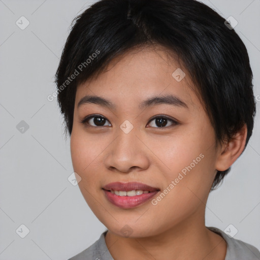 Joyful asian young-adult female with short  brown hair and brown eyes