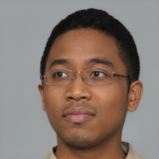 Neutral black young-adult male with short  black hair and brown eyes