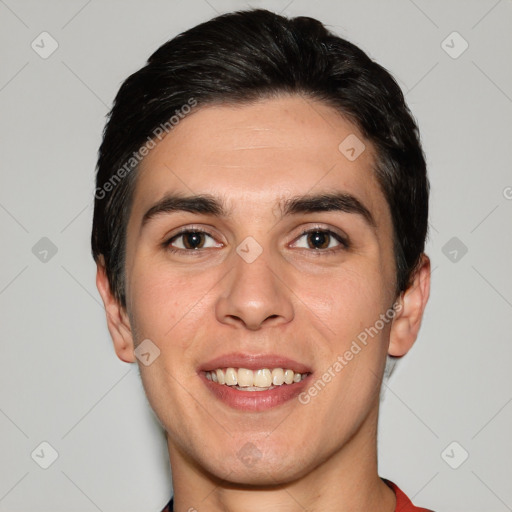 Joyful white young-adult male with short  black hair and brown eyes