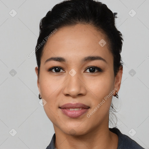 Joyful latino young-adult female with short  black hair and brown eyes