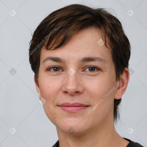 Joyful white young-adult female with short  brown hair and brown eyes