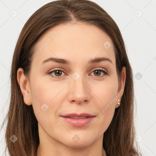 Joyful white young-adult female with long  brown hair and grey eyes