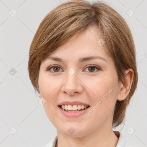 Joyful white young-adult female with medium  brown hair and grey eyes