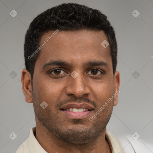 Joyful black young-adult male with short  brown hair and brown eyes