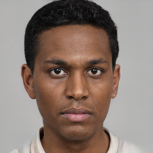 Neutral black young-adult male with short  black hair and brown eyes