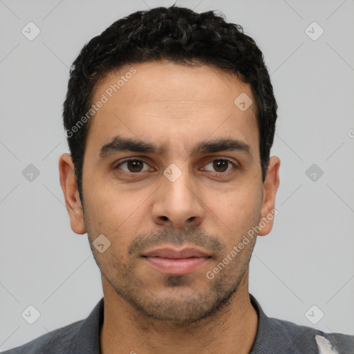 Neutral latino young-adult male with short  black hair and brown eyes