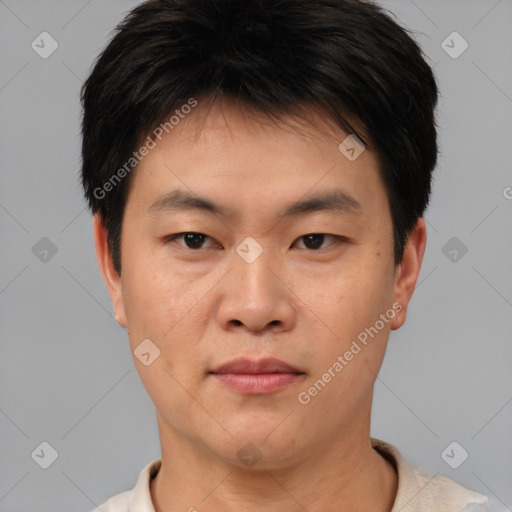 Neutral asian young-adult male with short  brown hair and brown eyes