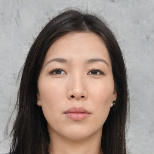 Neutral asian young-adult female with long  brown hair and brown eyes