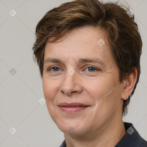 Joyful white adult female with short  brown hair and brown eyes