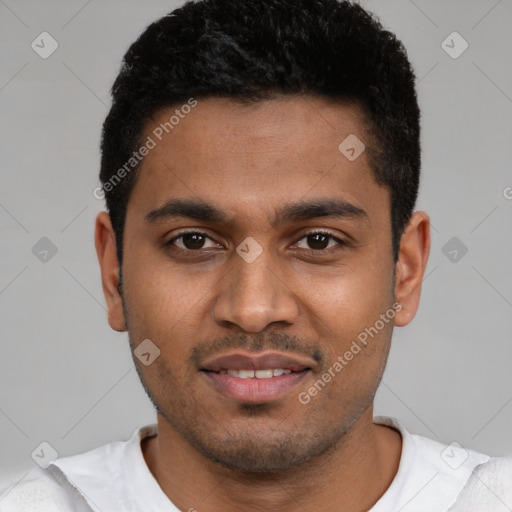 Joyful black young-adult male with short  brown hair and brown eyes