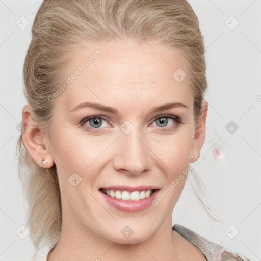 Joyful white young-adult female with medium  brown hair and blue eyes