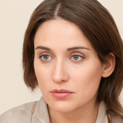 Neutral white young-adult female with medium  brown hair and grey eyes