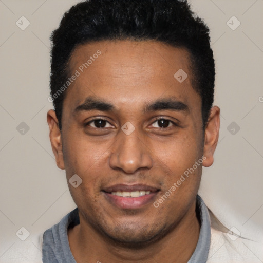 Joyful black young-adult male with short  black hair and brown eyes