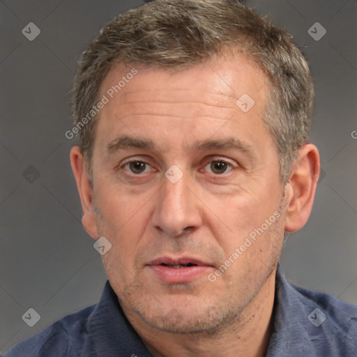 Neutral white middle-aged male with short  brown hair and brown eyes