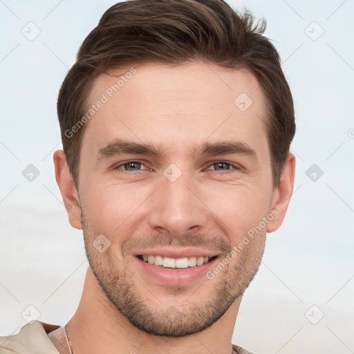 Joyful white young-adult male with short  brown hair and brown eyes