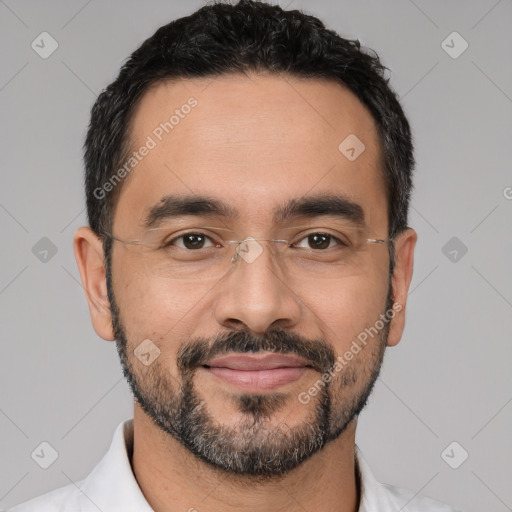 Joyful white adult male with short  black hair and brown eyes