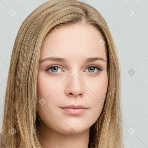 Neutral white young-adult female with long  brown hair and brown eyes