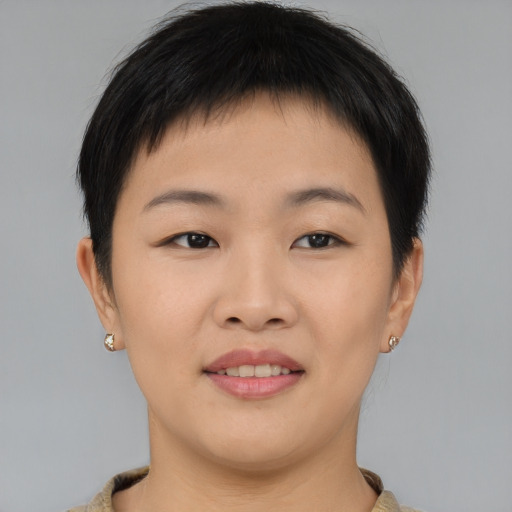 Joyful asian young-adult female with short  brown hair and brown eyes