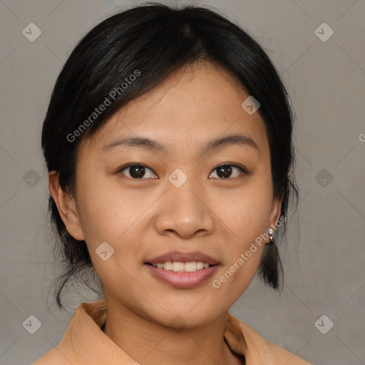 Joyful asian young-adult female with medium  brown hair and brown eyes