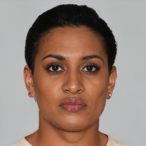 Neutral latino young-adult female with short  brown hair and brown eyes