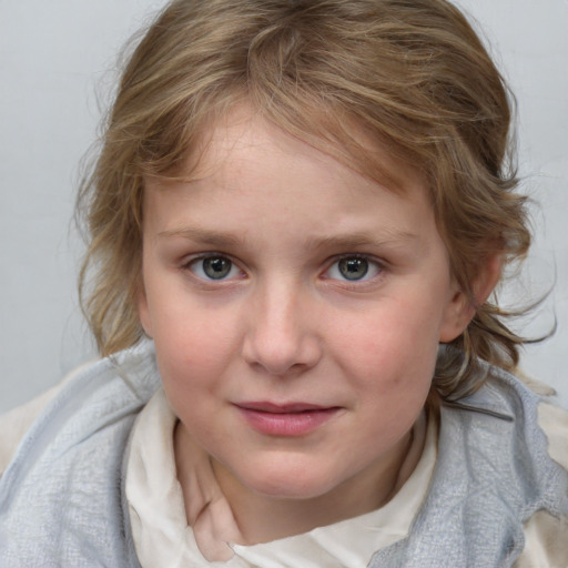 Joyful white child female with medium  brown hair and blue eyes