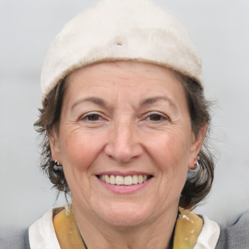 Joyful white middle-aged female with short  brown hair and brown eyes